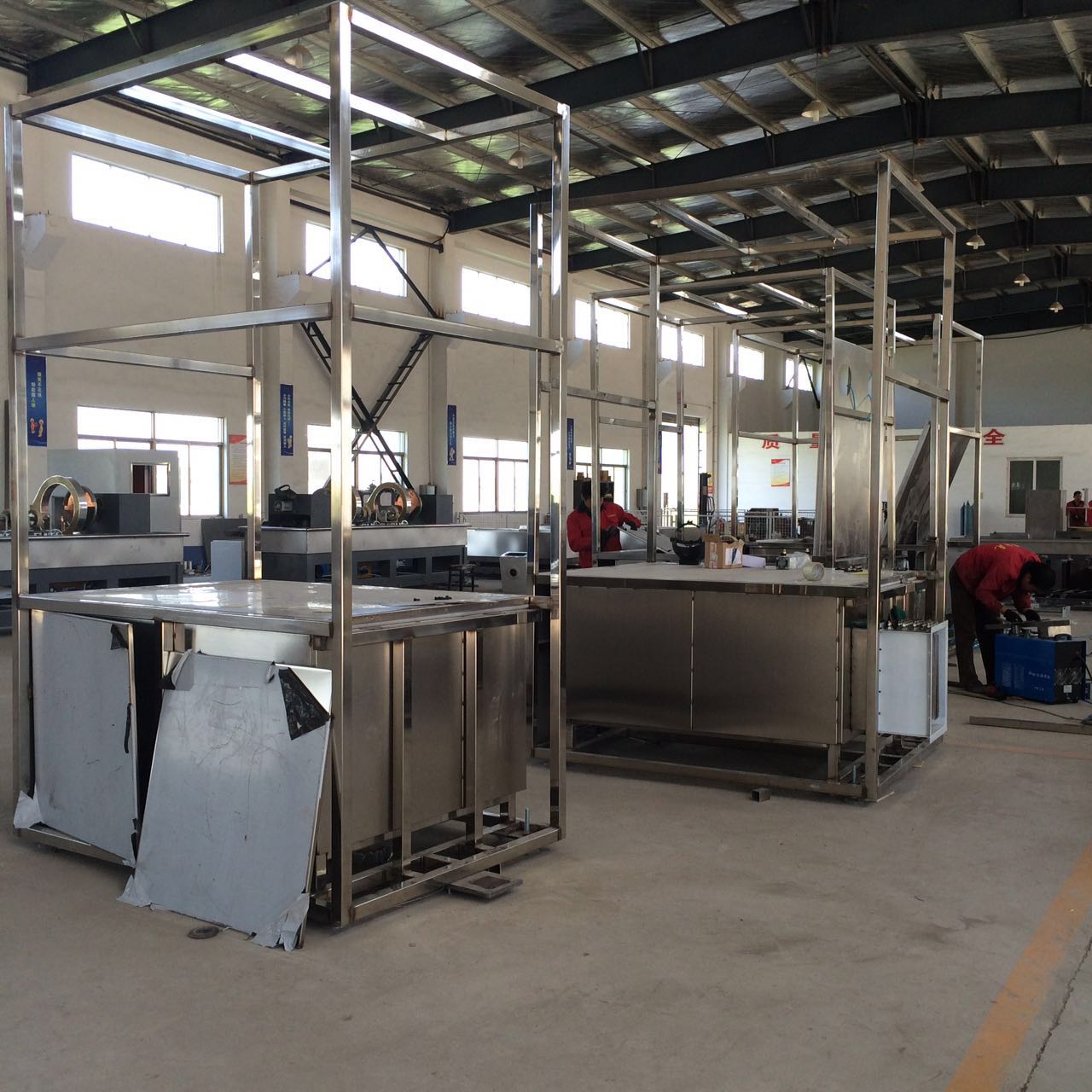 Non-destructive testing equipment inspecting automotive parts with fluorescent penetrant