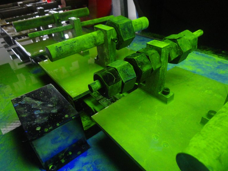Fluorescent magnetic particle detection