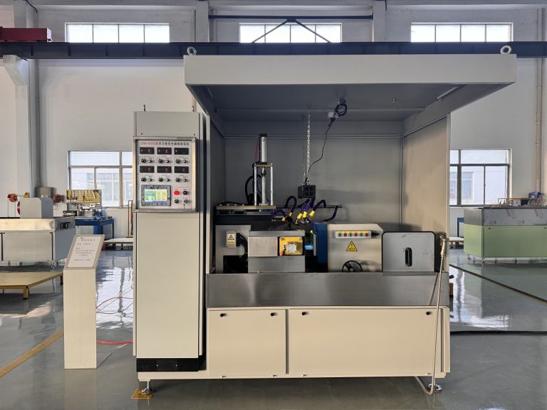 Working station of CNK-6000 fluorescent magnetic particle inspection machine showing magnetizing area.