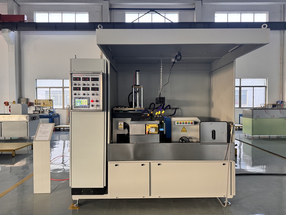 Working station of CNK-6000 fluorescent magnetic particle inspection machine showing magnetizing area.